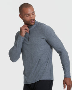 True ClassicMan wearing Heather Navy Active Quarter Zip Shirt with black workout pants.