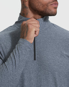 True ClassicHeather Navy Active Quarter Zip Shirt being zipped by tattooed hand.
