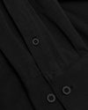 Black Long Sleeve Do-It-All Comfort Shirt with textured knit and buttons.