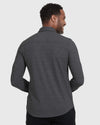 Model in Charcoal Heather Long Sleeve Gray Do-It-All Comfort Shirt, back view.