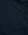 Navy Tall Heavyweight Long Sleeve Pocket Crew showcasing stitched front pocket.