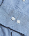 Banker Blue Stretch Oxford Long Sleeve Shirt with visible stitching and buttons.