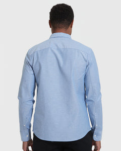 True ClassicBanker Blue Stretch Oxford Long Sleeve Shirt, back view, on model.