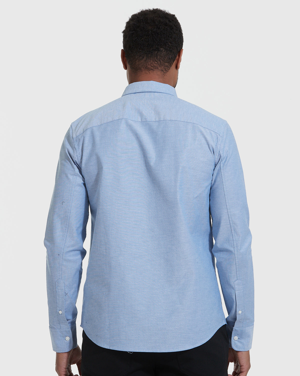 Banker Blue Stretch Oxford Long Sleeve Shirt, back view, on model.