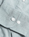 Moss Stretch Oxford Long Sleeve Shirt close-up with buttons and stitching.