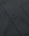 Close-up of Charcoal Heather Gray Long Sleeve Ripstop Commuter Shirt placket.