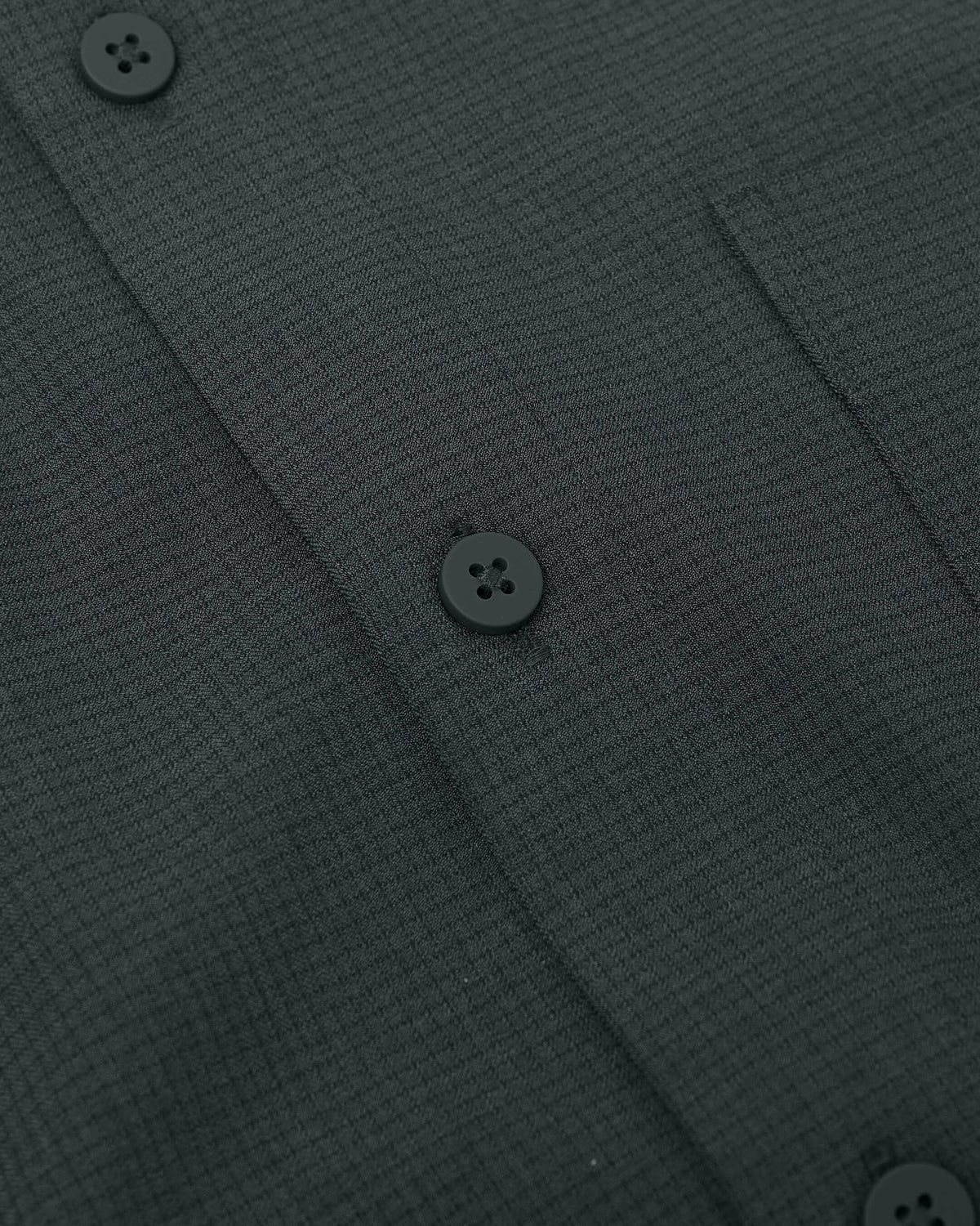 Heather Navy Long Sleeve Ripstop Commuter Shirt with grid texture and matte buttons.