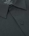 Heather Navy Long Sleeve Ripstop Commuter Shirt with textured knit, pointed collar.
