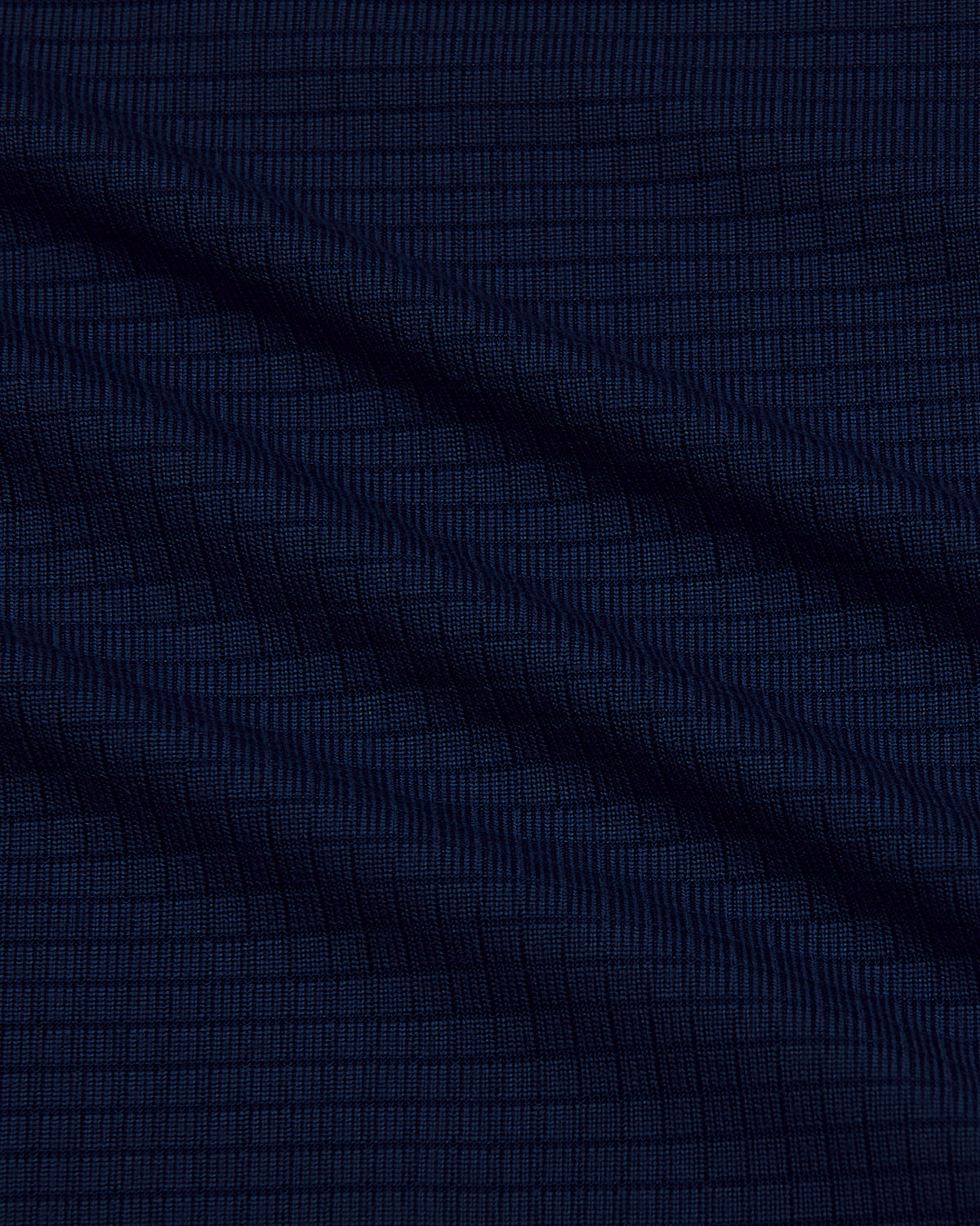 Navy Long Sleeve Active Mesh Crew with textured fabric and gentle draping.