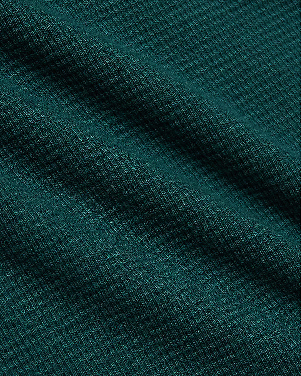Women's Deep Emerald Waffle Long Sleeve Boxy Henley, showing fine knit texture.