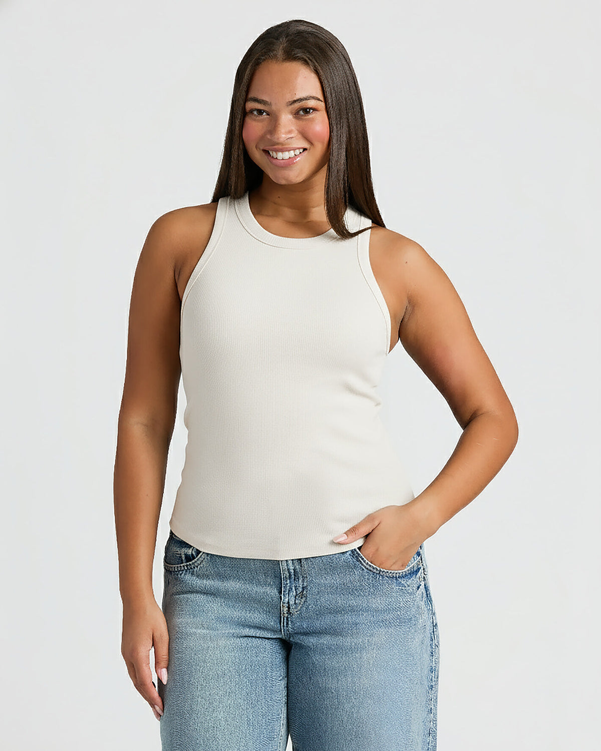 Womens Oatmeal Ribbed High Neck Tank styled with mid-wash jeans. MODEL_INFO: Jade is 5'9", wearing a size L