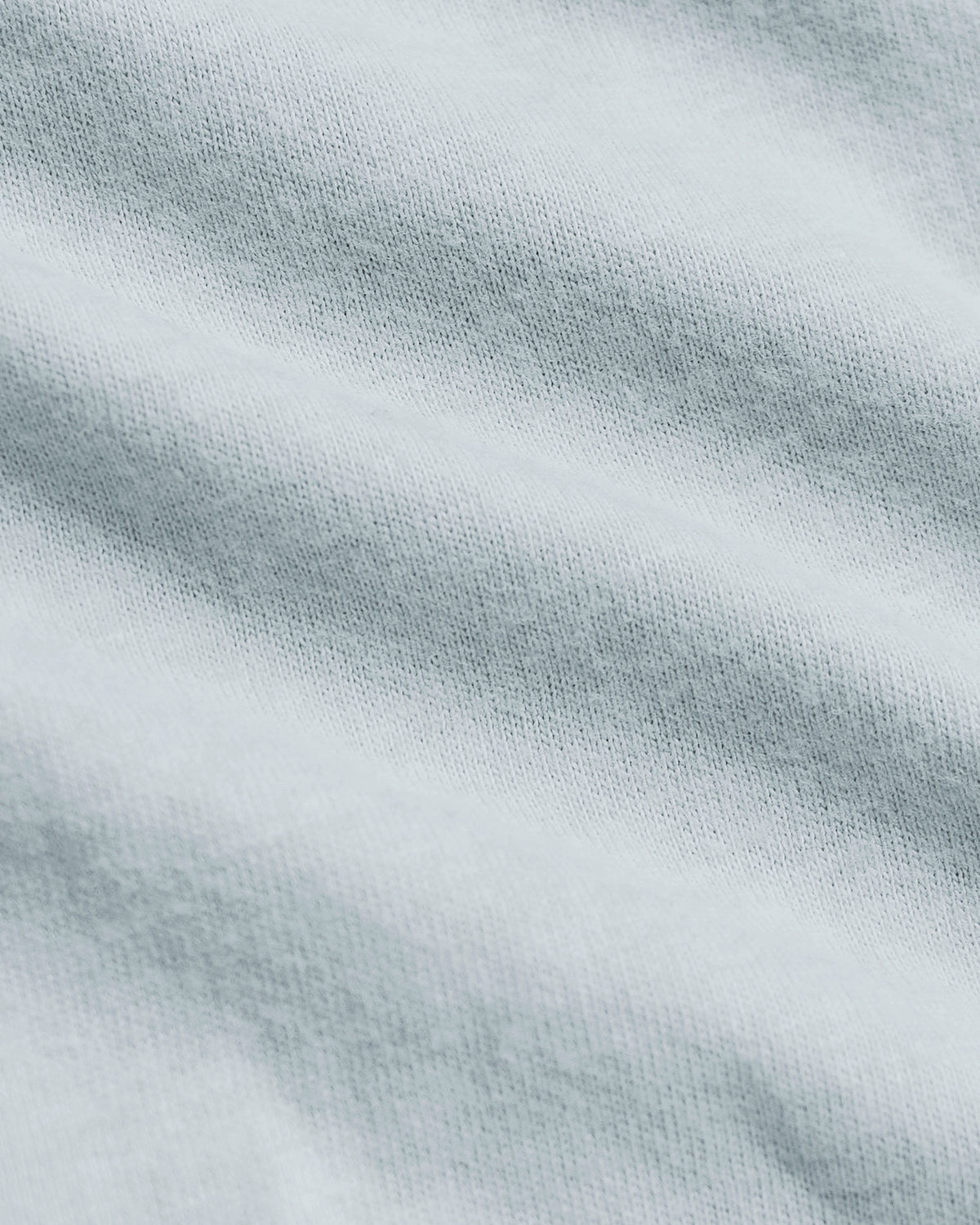 Icicle Tall Straight Hem Crew Neck T-Shirt close-up of knitted fabric.