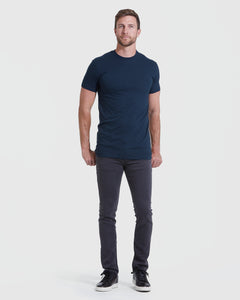 True ClassicMan wearing Navy Tall Straight Hem Crew Neck T-Shirt, slim-fit jeans.