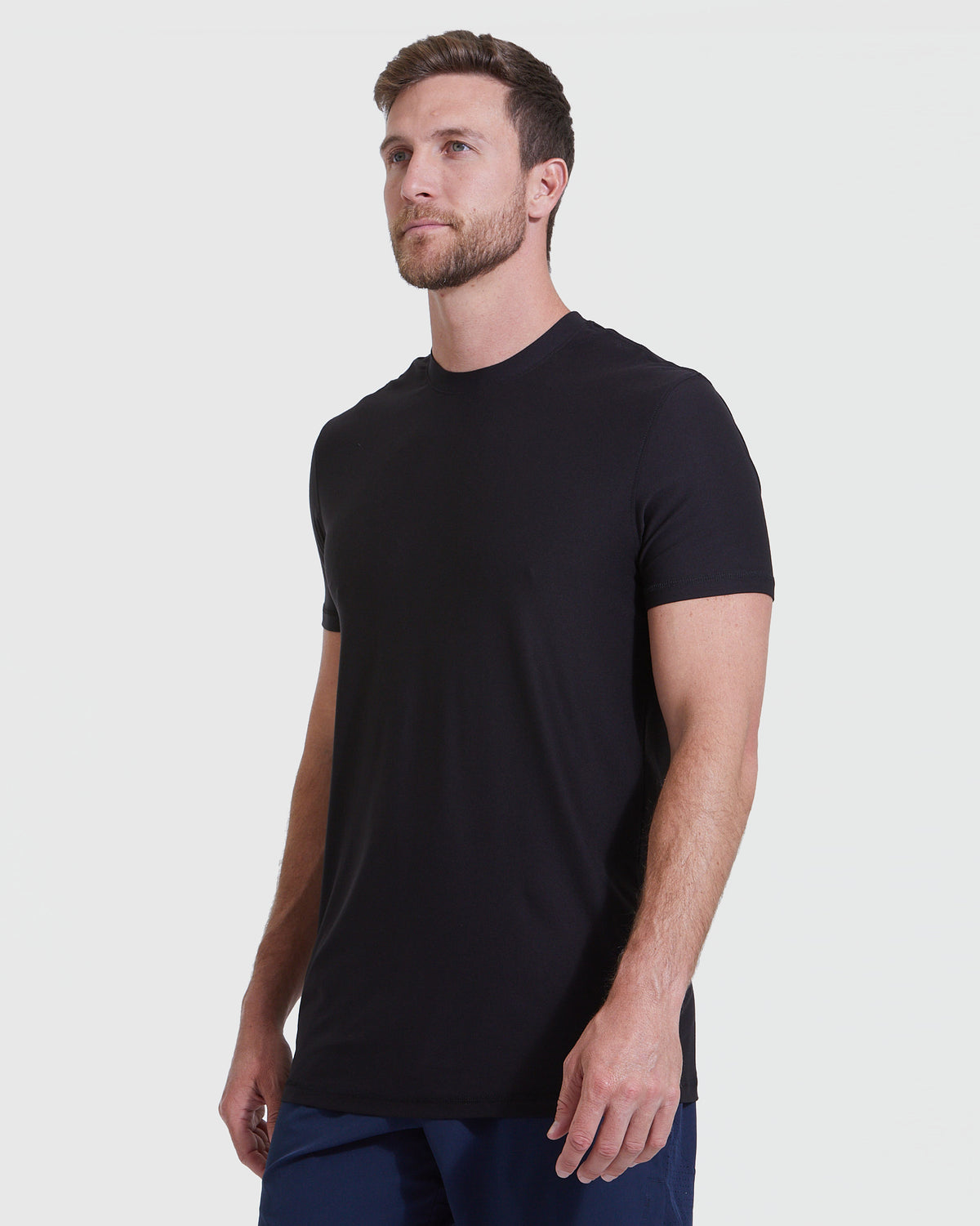 Black Tall Active Crew Neck 2.0 on fit bearded man.