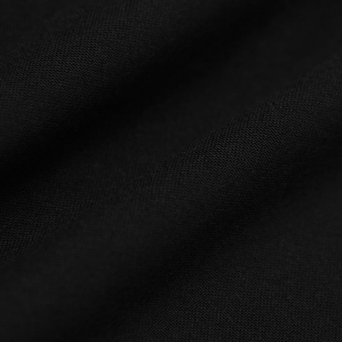 All Black Short Sleeve Tall Active Crew fabric with textured folds.