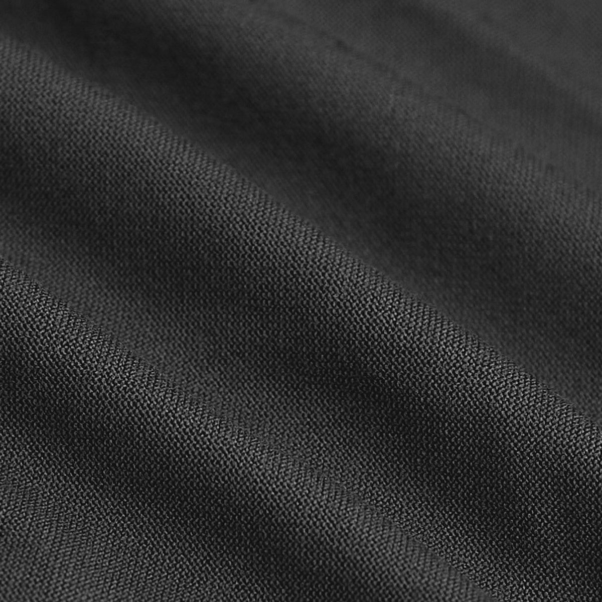 Carbon Tall Active Crew Neck 2.0, close-up of dark, woven fabric texture.