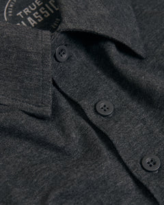 True ClassicCharcoal Heather Gray Short Sleeve Tall Polo with collar and buttons visible.