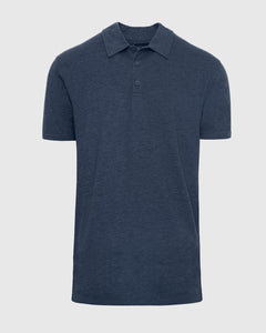 True ClassicNavy blue polo shirt on a light gray background