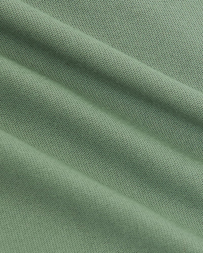 Camiseta deportiva talla alta cuello redondo