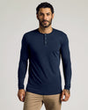 Man wearing Tall Classic Long Sleeve Henley in navy, showcasing fit and design.