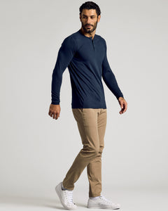 True ClassicMan wearing Navy Long Sleeve Tall Classic Henley with chinos and sneakers.