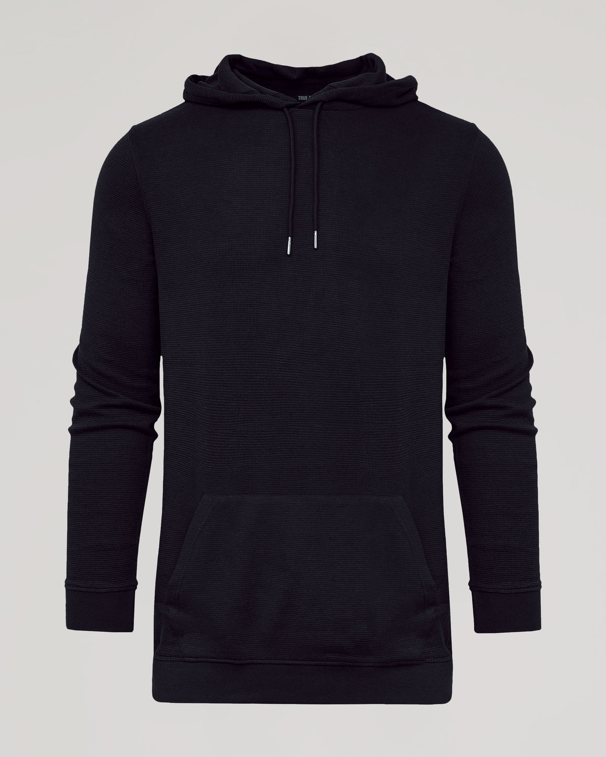 Black Tall Waffle Hoodie with drawstring hood, ribbed cuffs, and kangaroo pocket.