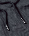 Carbon Tall Waffle Hoodie with black drawcords and shiny metal aglets.