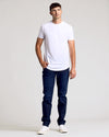 White Short Sleeve Tall Curved Hem Crew worn by young man.