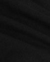 Close-up of Black Tall Active V-Neck fabric texture and folds.