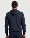 Navy Fleece French Terry Zip Hoodie's back view.