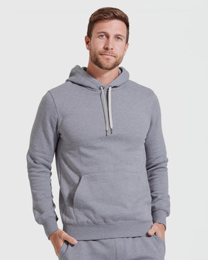 Man wearing Heather Gray Fleece French Terry Pullover Hoodie.
