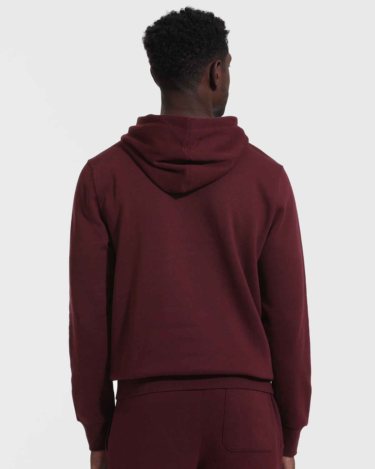 Back view of Mahogany Fleece French Terry Pullover Hoodie and joggers.