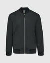 Black Bomber Jacket with brass zippers and orange lining.