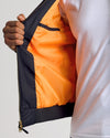 Black Bomber Jacket with orange lining and brass zipper.
