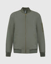 Carbon Bomber Jacket with ribbed collar, orange lining, and brass zippers.