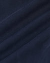 Navy Bomber Jacket fabric detail with visible weave and creases.