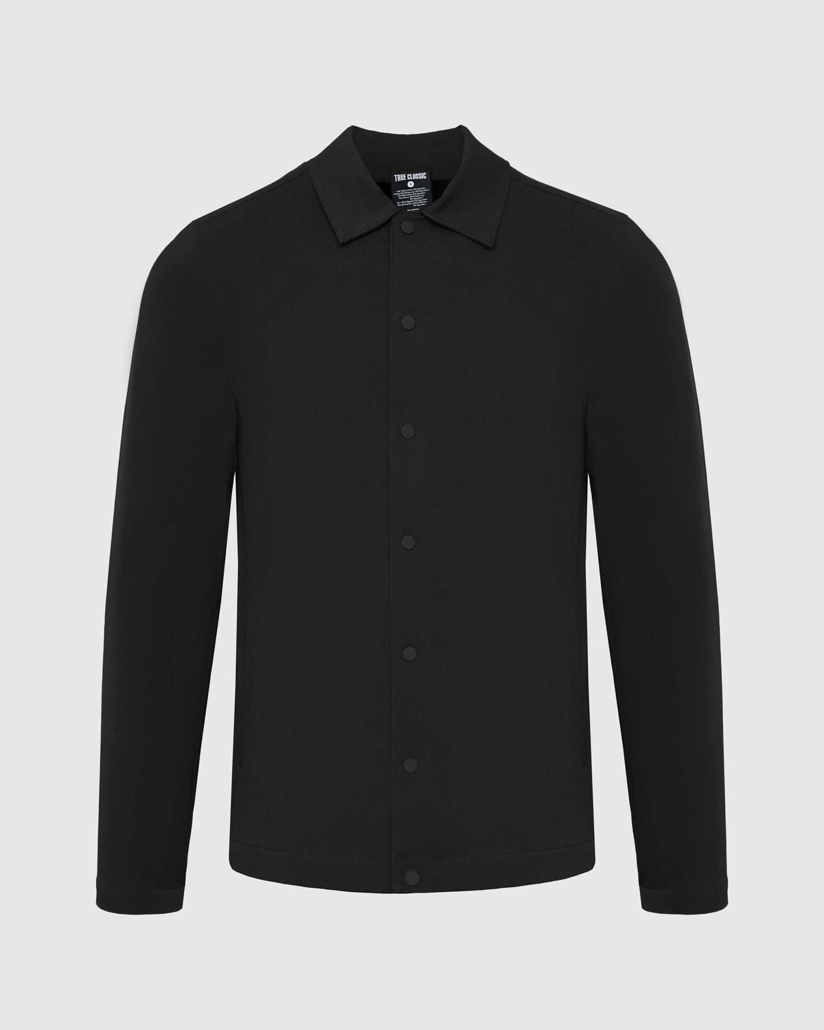 Black Coaches Jacket with snap-button front, long sleeves, and multiple pockets.