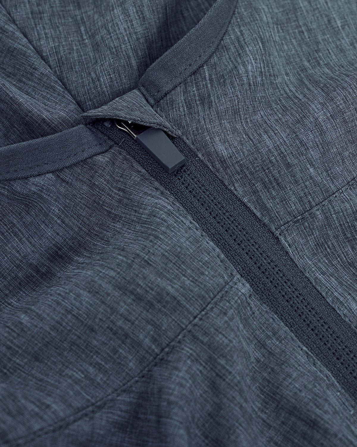 Heather Navy Active Shell Jacket with black zipper and heathered fabric texture.