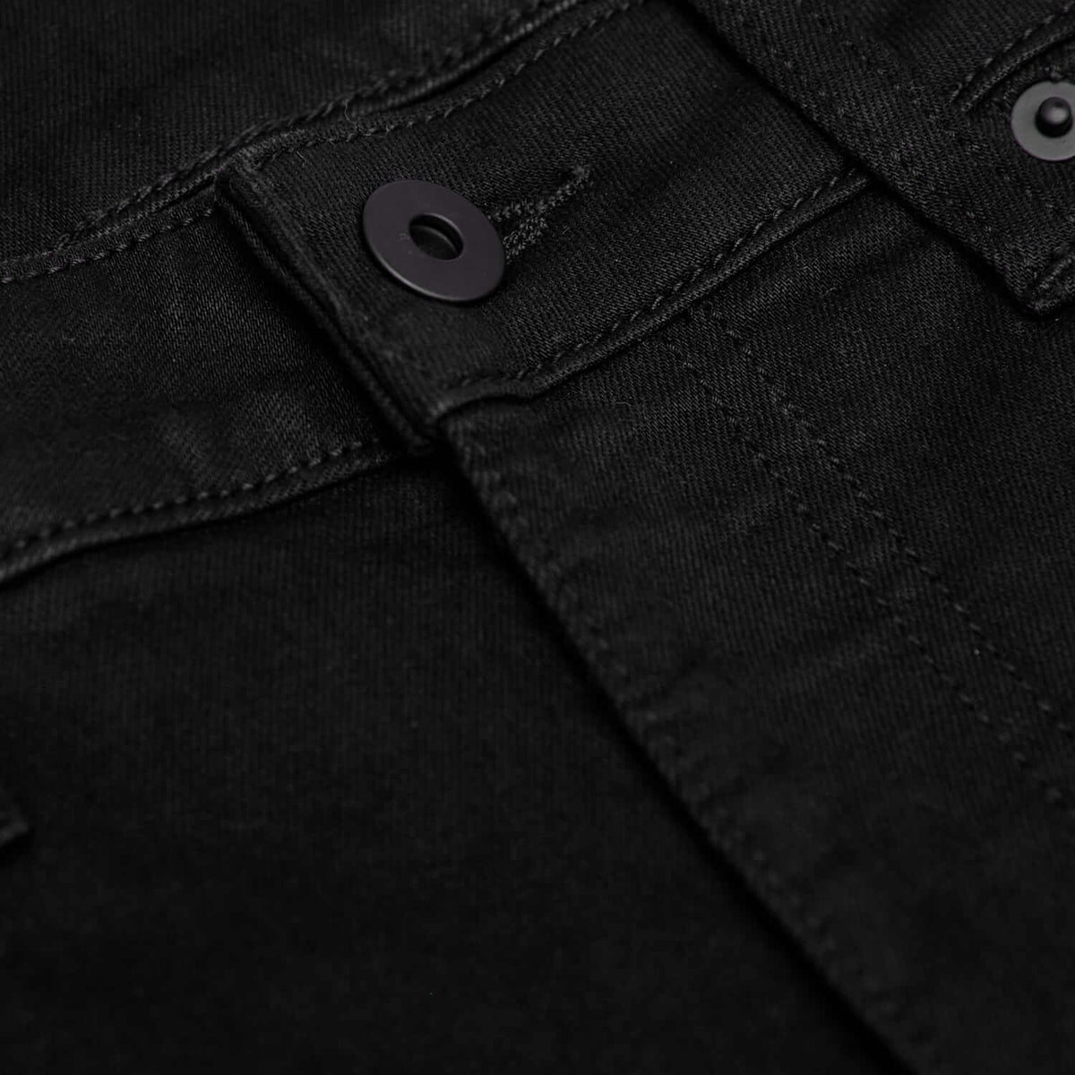 Black Wash Slim Comfort Stretch Jeans with snap-button and detailed stitching.