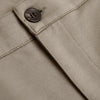 Khaki Slim Comfort Knit Chino Pant close-up, showcasing seam stitching and button.