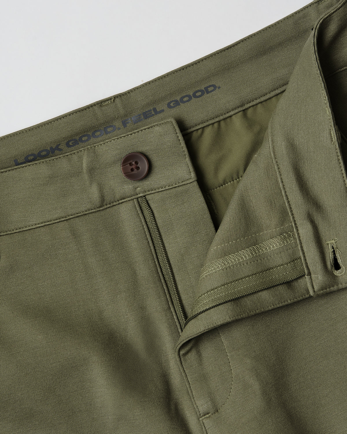 Military Green Slim Comfort Knit Chino Pant, waistband and fly details.