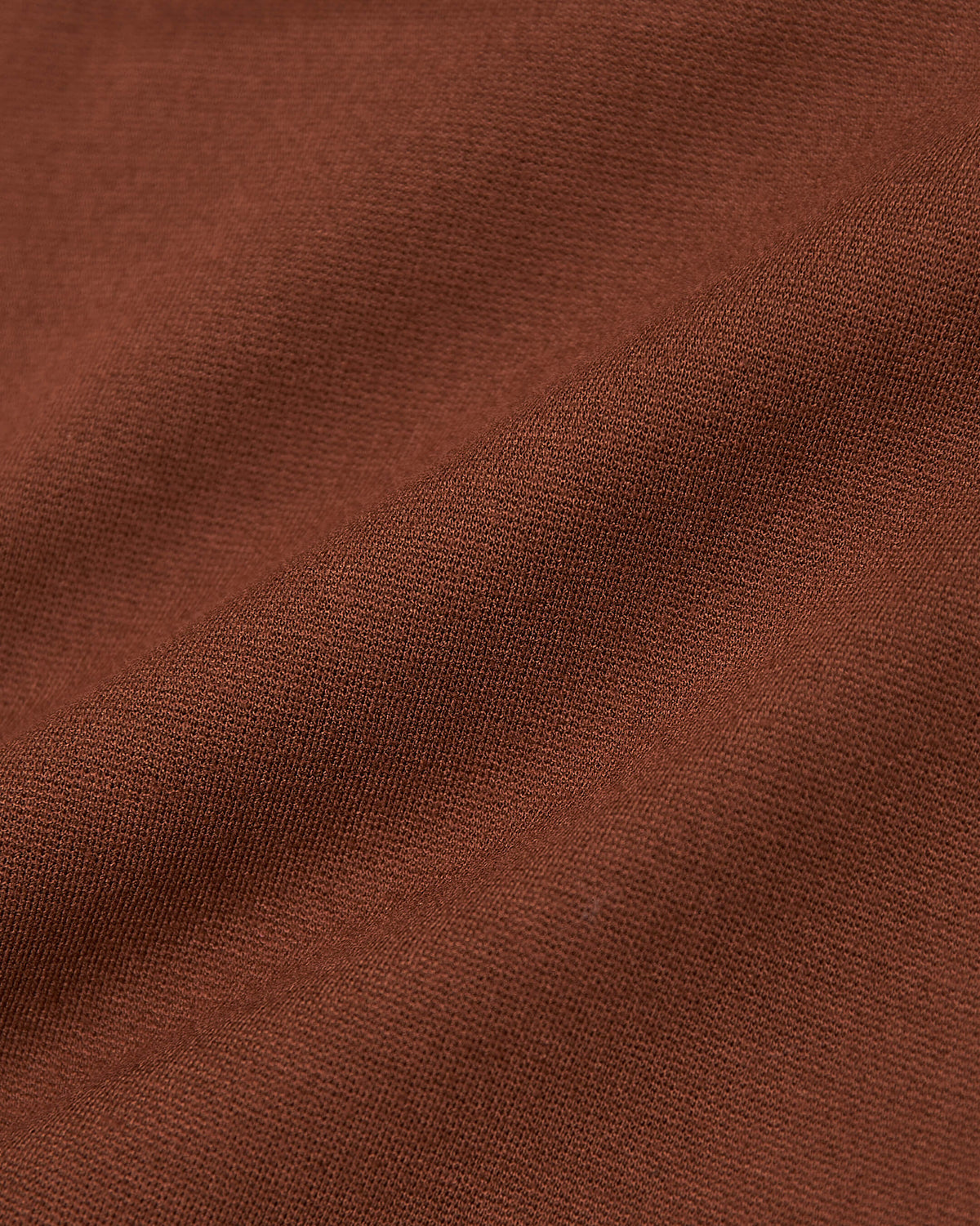 Suede Brown Slim Comfort Knit Chino Pant close-up of woven texture.