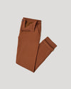 Suede Brown Slim Comfort Knit Chino Pant, folded with cuffed hem.