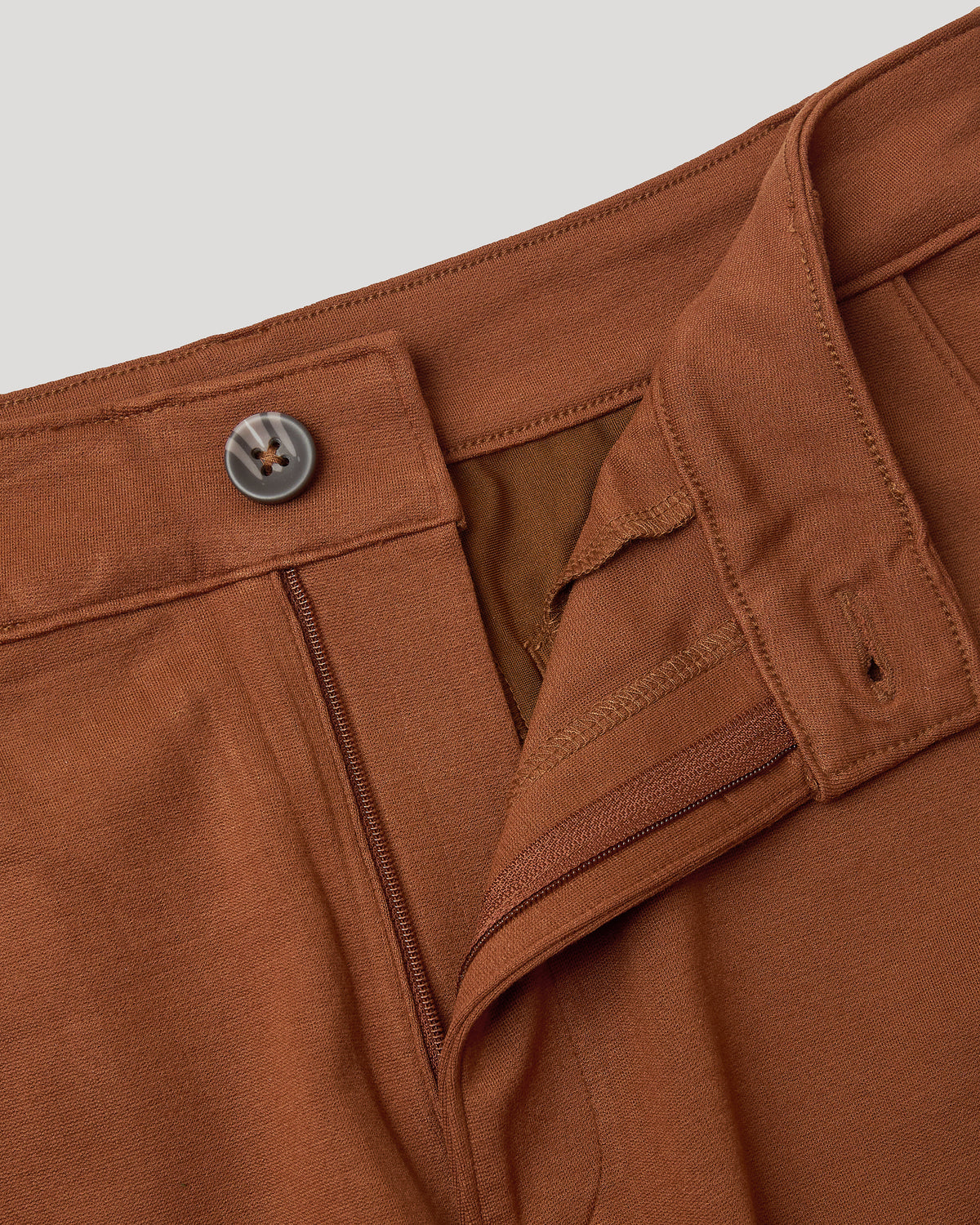 Suede Brown Slim Comfort Knit Chino Pant waistband with button and zipper.
