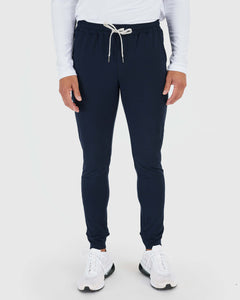 True ClassicActive Sampler 3-Pack: navy joggers, white sneakers, white long-sleeve top.