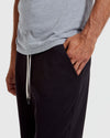 Black Full Zip Fleece Hoodie & Jogger 2-Pack worn casually.