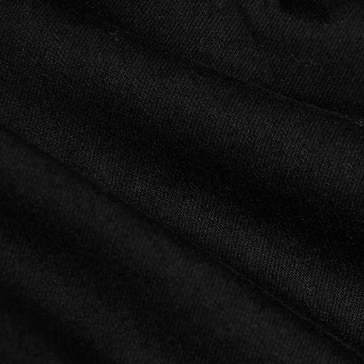 Black Wash Straight Comfort Stretch Jeans close-up, showcasing diagonal twill weave.