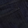 Close-up view of dark indigo denim fabric showing detailed stitching on the back pocket of the Indigo & Gray Straight Comfort Jeans 3-Pack men's basics.