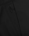 Black Slim Twill Chino Pant's zipper on black twill fabric.