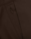 Dark Oak Straight Twill Chino Pant, close-up of durable fabric, zipper detail.